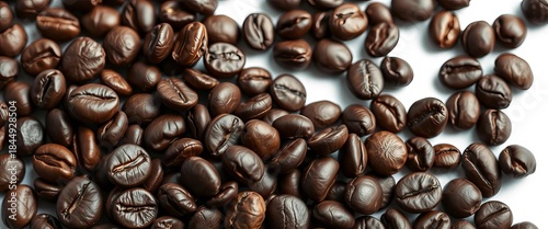 Dark espresso beans closeup, rich brown hues against stark white ,  single origin,  texture