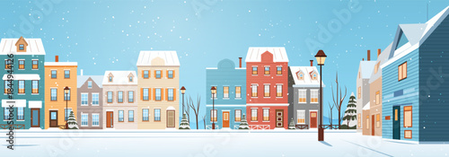 Christmas winter cityscape snowy street festive houses lampposts snowflakes blue sky colorful buildings trees urban neighborhood seasonal background