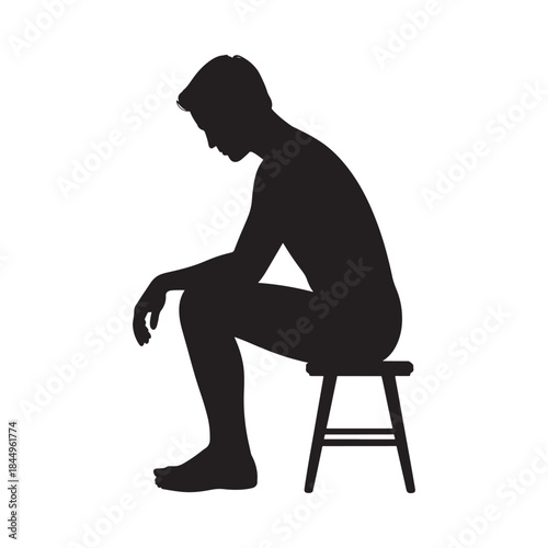 A solitary figure sits in contemplation a silhouette against a stark white background
