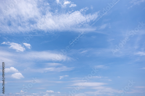 clear blue sky background,clouds with background, Blue sky background with tiny clouds. White fluffy clouds in the blue sky. 