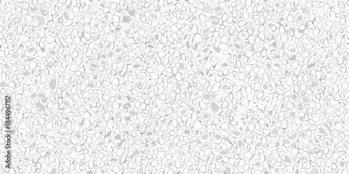 A full frame view of small white and gray pebbles covering the surface