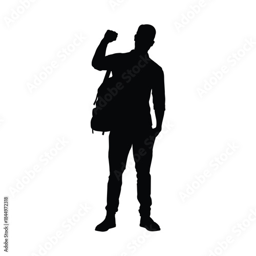 Young Man in Casual Attire with Backpack Silhouette Standing Confidently, Raising a Fisted Hand in a Gesture of Success