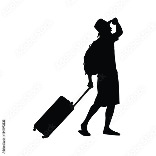 Silhouette of a Male Tourist with a Hat and Backpack Pulling a Suitcase, Looking into the Distance, Ready for Vacation