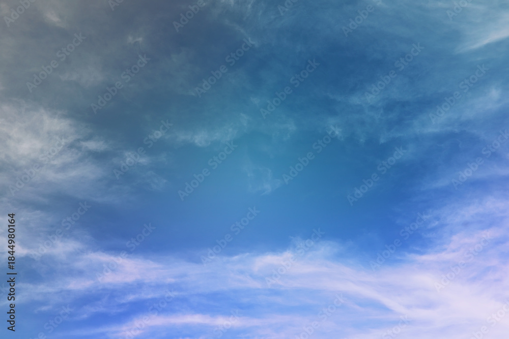 Fototapeta premium Beautiful sunset sky above clouds with dramatic light. Cabin view from airplane