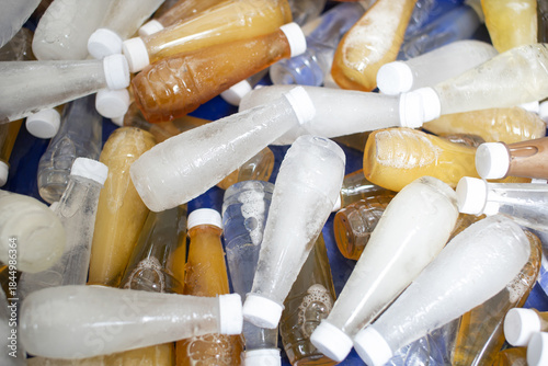 Drinking water and fruit juice in plastic bottles.