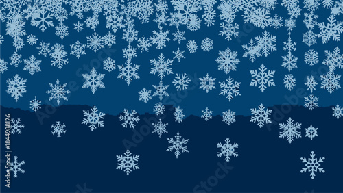 Elegant White Snowflakes Falling on Deep Blue Winter Background