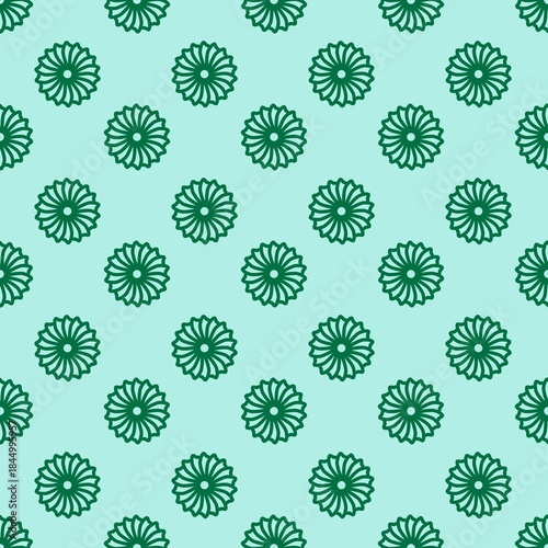 Geometric floral seamless pattern with dark green abstract sunburst mandala flowers on a light mint background. Ideal for textile, fabric, wrapping, wallpaper, and background.