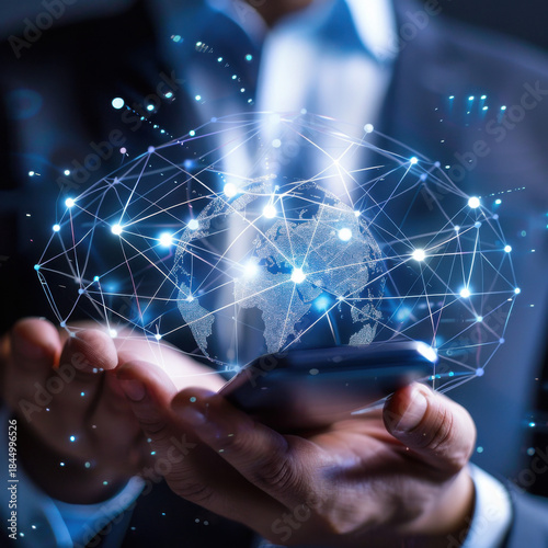 Digital Communication: A modern businessperson engages in global connection with the world, connecting, managing, and exchanging data in the palm of their hand, representing connectivity, networking.