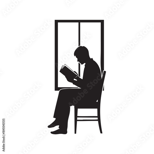 Black silhouette of a person sitting on a chair by a window, engrossed in reading a book, depicting leisure, education, and relaxation indoors.
