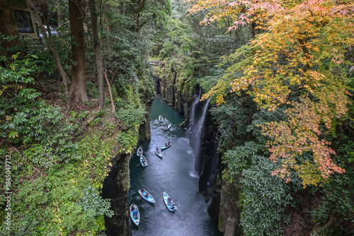 фотографія Landscape View Of Trail To Takachiho Gorge With Boats Rowing By Manai Falls, Muk