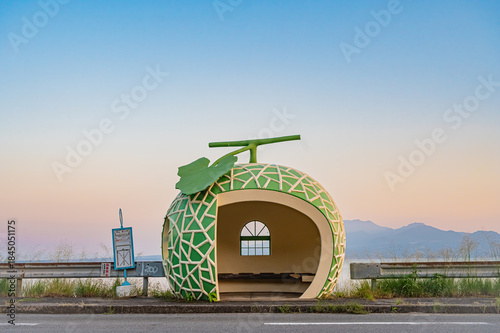 Sunset at a Fruit-Shaped Bus Stop in Nagasaki, Japan – Clear Sky Silhouette at Golden Hour