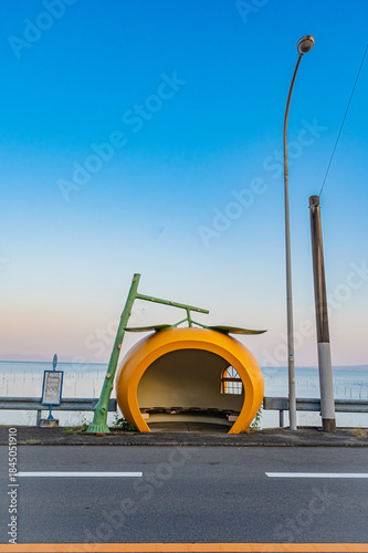 Sunset at a Fruit-Shaped Bus Stop in Nagasaki, Japan – Clear Sky Silhouette at Golden Hour