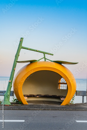 Sunset at a Fruit-Shaped Bus Stop in Nagasaki, Japan – Clear Sky Silhouette at Golden Hour