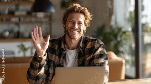 Wallpaper Mural Friendly Male Smiling and Waving While Sitting at a Desk Torontodigital.ca