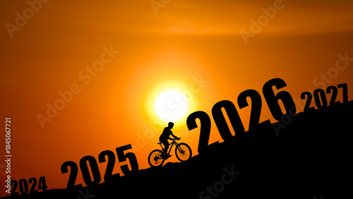 Silhouette of a cyclist ascending a hill towards the future goals and challenges 2025 2026