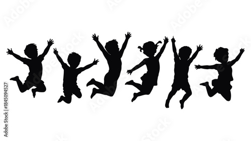 Silhouette of happy children jumping and celebrating together