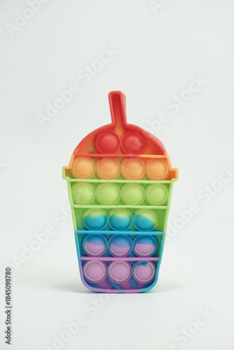 Pop It Toy Cup / Fidget Toy
Colorful silicone pop it toy shaped like a cup, isolated on white background, stress relief and sensory toy for children and adults.
