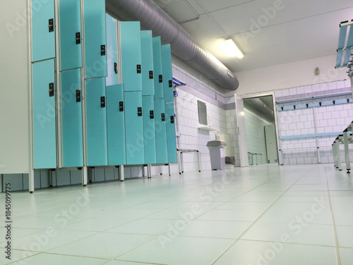 Lockers in empty locker room at sports club. Fitness center and swimming pool. Sports and health.
