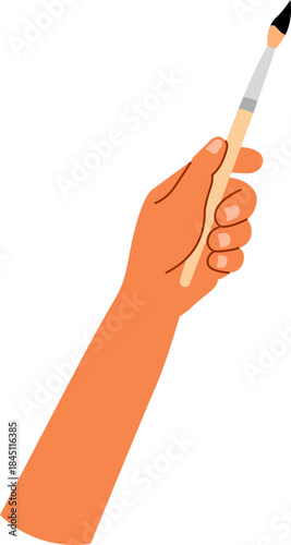 Hand Holding a paintbrush. Artist is painting.