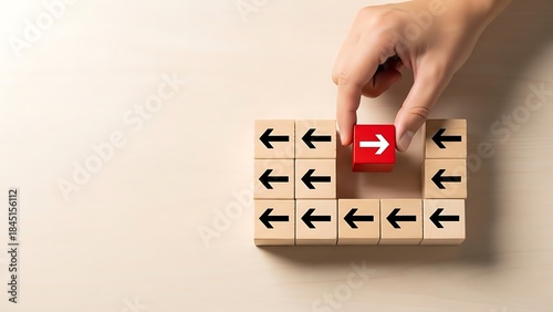 Challenging the status quo A red arrow cube bravely points in a unique direction, symbolizing innovation, leadership, and breaking from convention, inspiring a new path
