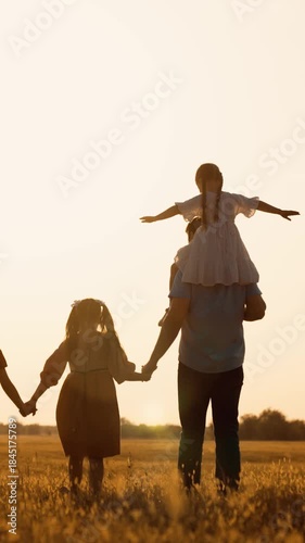 happy family child kid baby together teamwork dream fly children's dream silhouette sunset field park sun father mother, peaceful family time, golden hour family, siblings sunset play, carefree family
