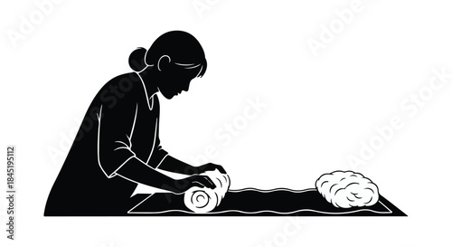 Person carefully folding a white towel on a dark surface, symbolizing cleanliness and organization.