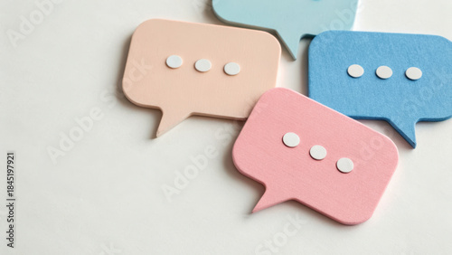 Online presence creative visual. Colorful speech bubble icons with soft pastel tones create playful and communicative vibe