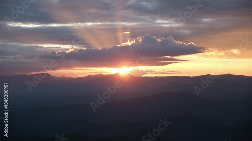Landscape image of mountains view and sunset sky on cloudy day