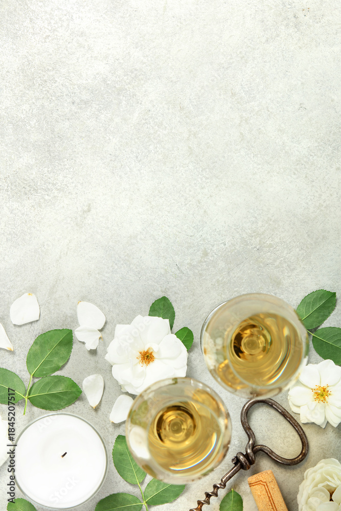 Fototapeta premium Wine Tasting Flat Lay with Roses, Petals, and Corkscrew