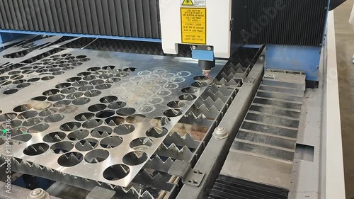 Laser cutting machine. Working process of laser cutting machine. Powerful laser beam for cutting. Cut stainless steel metal. Metal cutting machine. High precision, creating complex shapes CNC