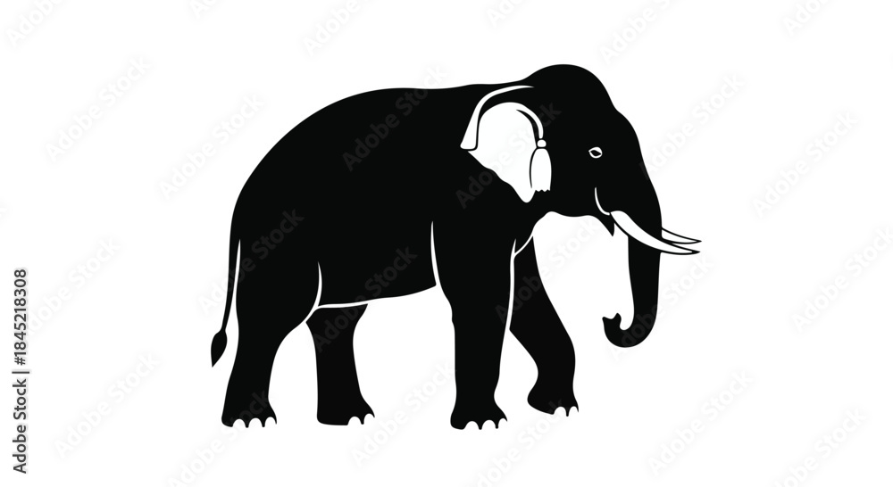 Obraz premium Majestic elephant silhouette walking with tusks and trunk raised