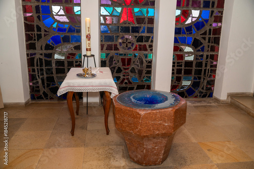 Cuadro en lienzo babtism fountain with table with crism oil