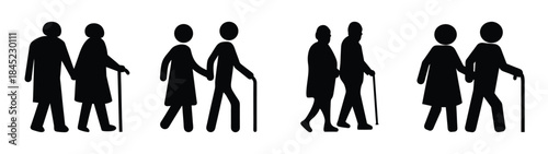 Elderly couple walking together hand-in-hand, one with cane