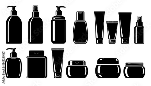 Collection of black cosmetic containers including bottles, jars, and tubes, arranged neatly on a white background, showcasing various shapes and sizes for beauty product design