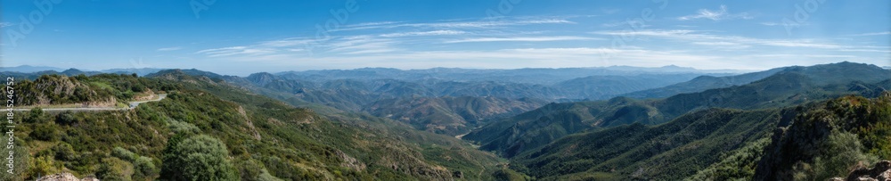 Naklejka premium Panoramic view of andalusian mountains under clear blue sky
