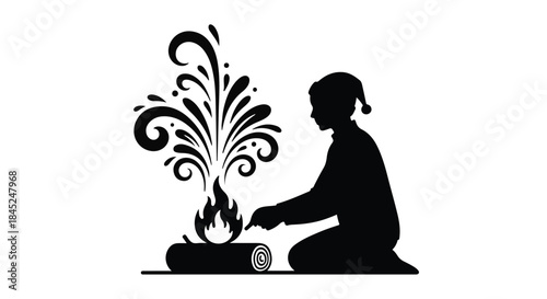 Silhouette of a person in a hat tending a campfire with decorative sparks