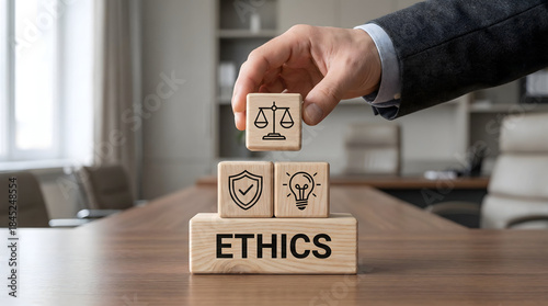 Businessman building ethics concept with wooden blocks in office