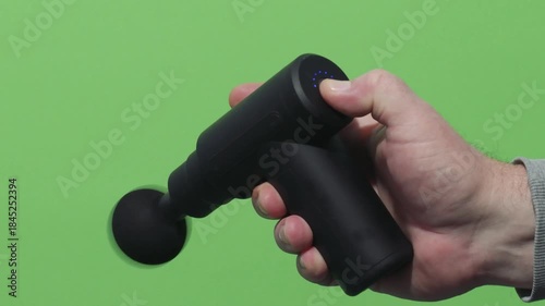 Turn off the manual vibration massager. Green screen