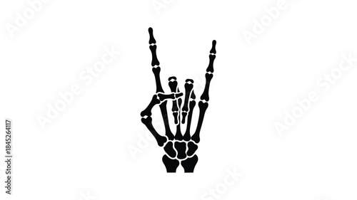 A dark skeletal hand making the rock on gesture a striking silhouette