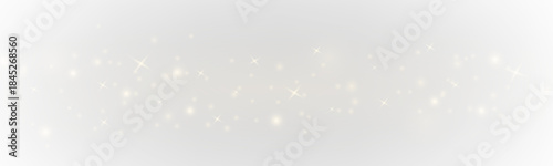 Valokuva Warm golden dust scatters softly, producing a rich glowing shimmer