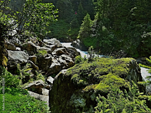 Austrian Alps - view of the stream below the Grawa waterfall in Stubai Alps near village Mutterberg