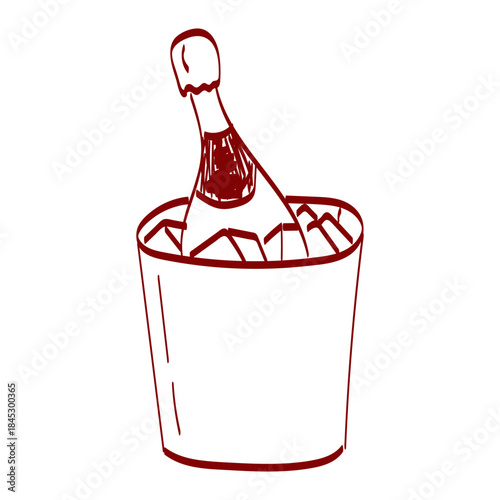 Bottle of champagne in an ice bucket ready for a celebration at a social gathering in a casual setting