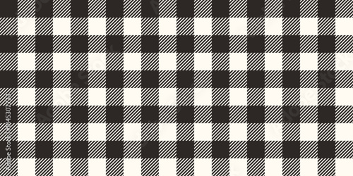 Black and white checkered seamless pattern. Vichy print background with geometric grid texture. Gingham fabric design, textile backdrop.