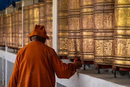 spinning giant prayer wheels, Tagong temple, Tagong Grassland, Garzê Tibetan Autonomous Prefecture, Sichuan,  China