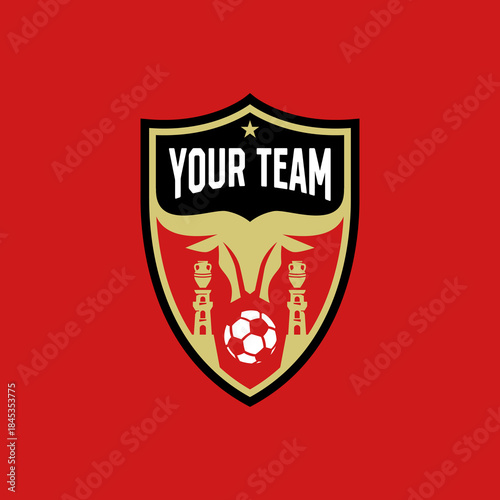 A bold emblem for a football club, featuring a traditional clay gate and a mighty buffalo.