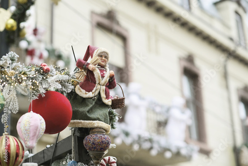 Holiday Figurine in Garland Display at Craiova Christmas Market