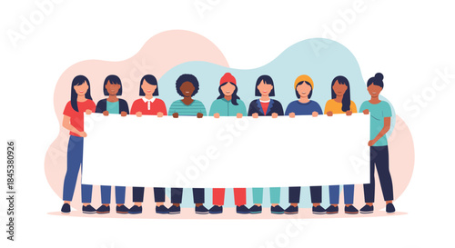 Diverse group of smiling women of different ethnicities and ages standing together and holding a large blank white banner.