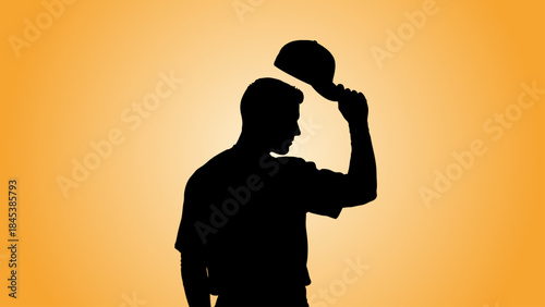Silhouette of a Man Tipping His Hat in Greeting or Farewell Against a Warm Orange Gradient Background baseball