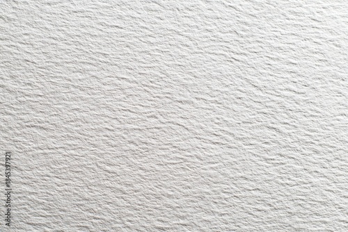 Close up of rough white watercolor paper surface grain.