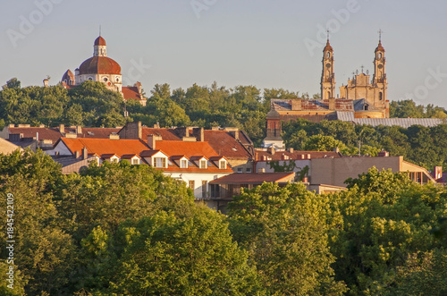 Vilnius, Lithuania. Fragment of the old city from the high point. Church of the Sacred Heart of Jesus, Church of the Ascension (Missionary Church) and other historical buildings. Photo taken in 2014.